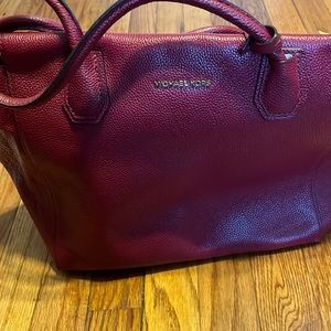 Looking to sell my red Michael kors bag. Used but in good condition